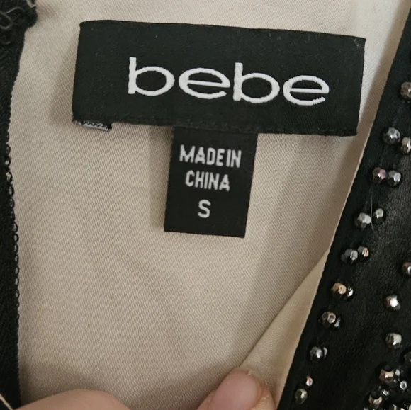 BEBE 90s Beaded top peplum mini dress. Size small - Picture 6 of 11